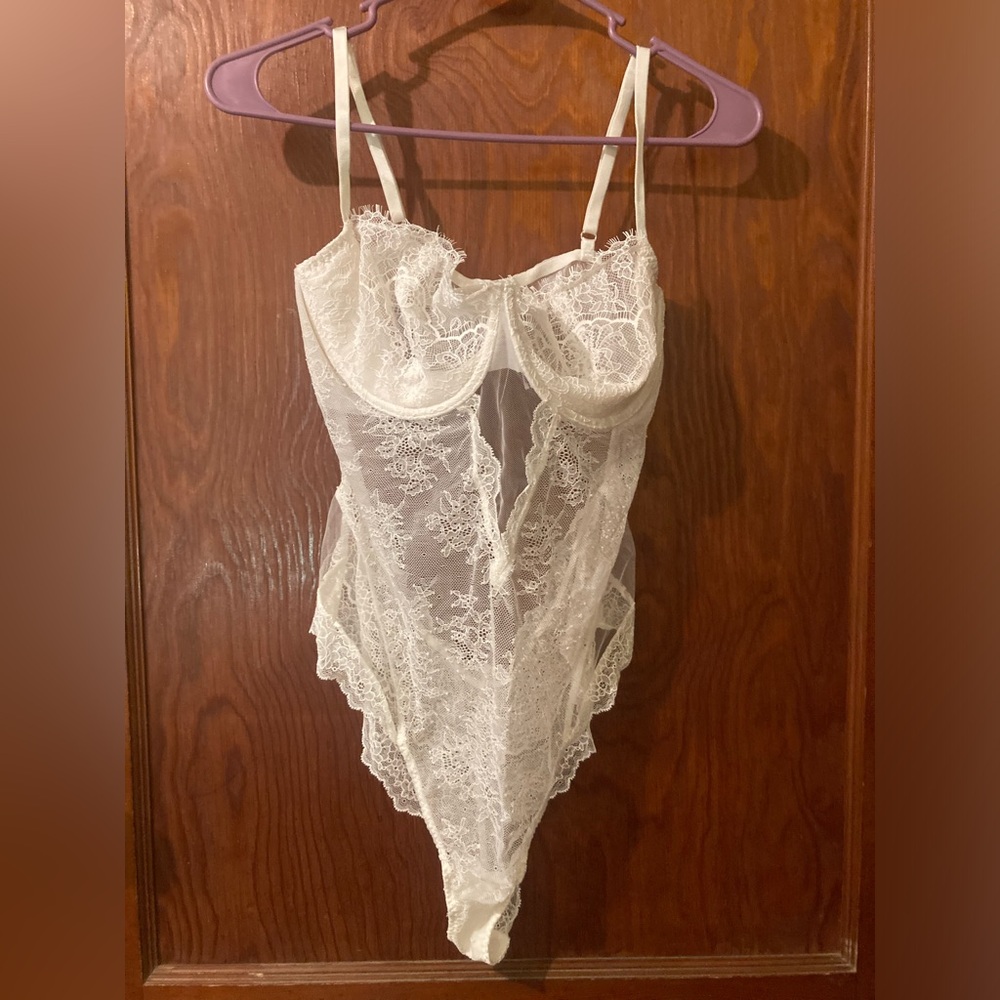 Lacey white one-piece lingerie.